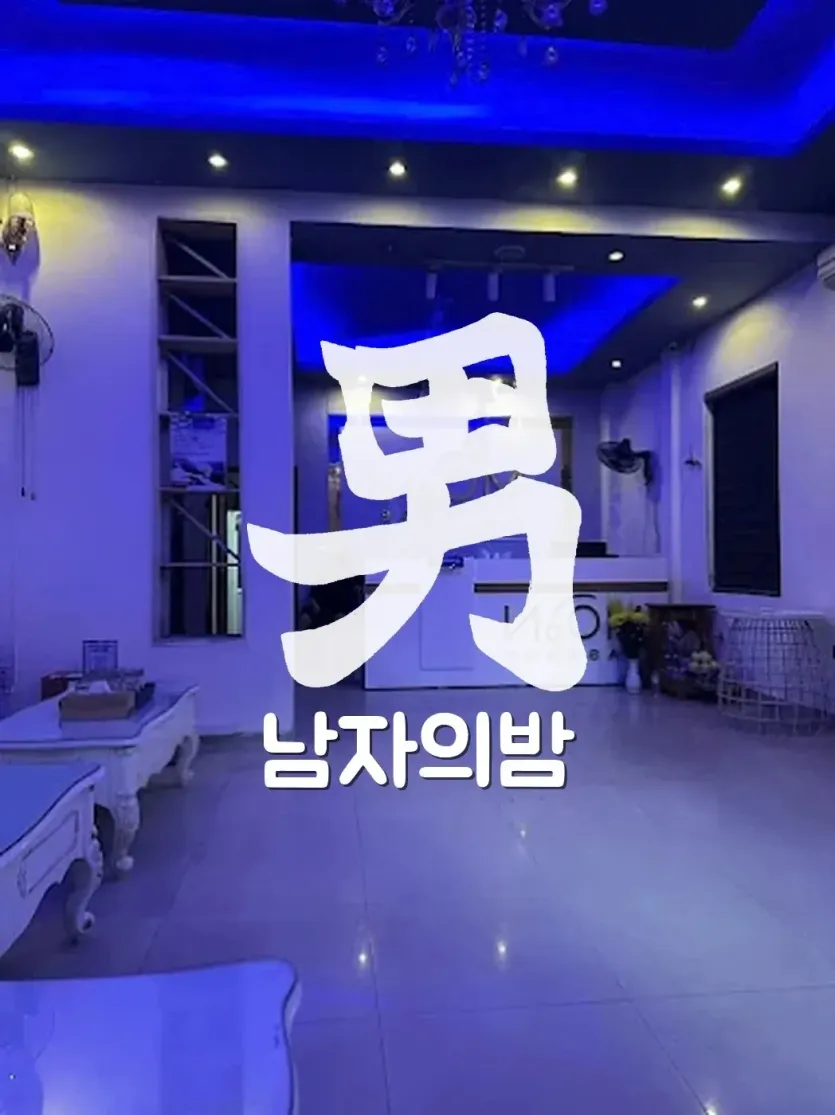 하노이 문 마사지 딘톤 골목 입구와 매장 외관